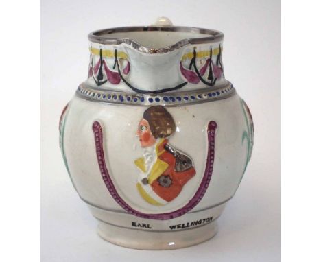 Wellington commemorative jug circa 1812, moulded with a portrait titled Earl of Wellington, the sides moulded with hops and p