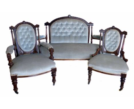 Victorian walnut framed three piece salon suite comprising sofa, gentleman's open arm chair and nursing chair, each with carv