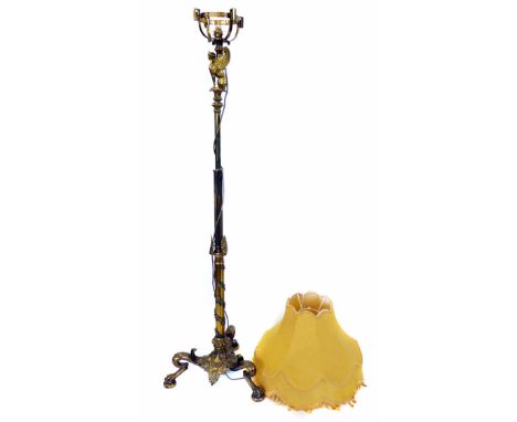 Late Victorian heavy brass telescopic floor lamp, decorated all over with classical motives, originally supporting an oil lam