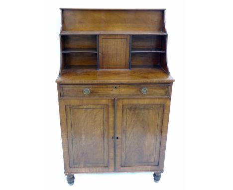 Early 19th century mahogany side cabinet, top section with two shelf bookcase, flanking central cupboard, frieze drawer with 