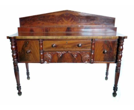 William IV mahogany sideboard, architectural back board over central shallow drawer flanked by a cellaret drawer and cupboard
