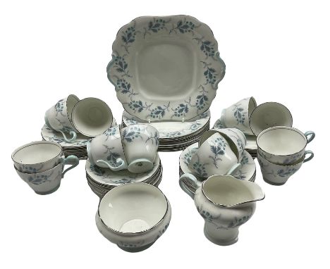 Aynsley part tea set in Las Palmas pattern comprising tea cups, saucers, sandwich and cake plates, cake platter, milk jug and