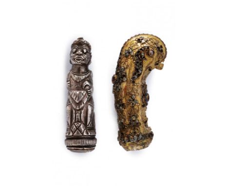 dating: 19th Century provenance: Indonesia, One completely in silver, carved to effigy a stylized character. One i gilded cop