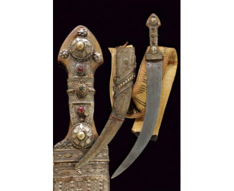 dating: circa 1900 provenance: Arabia, Long, curved, flat, double-edged blade. Grip with horn grip scales. The front one almo