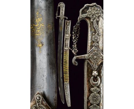 dating: 19th Century provenance: Arabia, Wide, curved, single-and short false-edged blade, with a large, central fuller and o