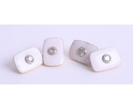 A good pair of 18ct gold enamel and diamond set cufflinks.