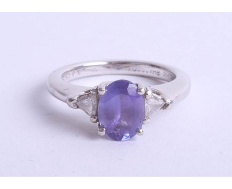 A platinum and tanzanite set ring, the shank stamped 1.33 (carats), marked 'Rhapsody', platinum 950, size K.