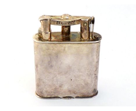Dunhill, a 1930s silver plated table lighter, no. 737413, 11cm high CONDITION: light scuffs and scratches commensurate with a