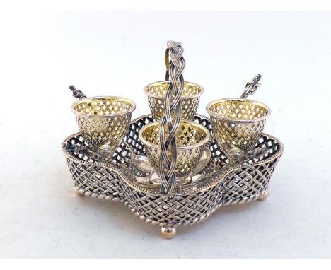 A Victorian silver four-cup egg cruet by Henry Wilkinson & Co., Sheffield, 1853, quatrefoil form with basket-work sides and f