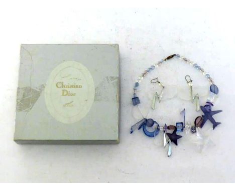 Christian Dior, a 1980s costume necklace and earring suite, in its original box CONDITION: good 
