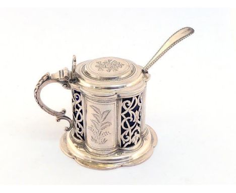 A Victoran silver drum mustard pot by Henry Holland, London, 1876, on wavy-rimmed circular foot, the shaped body alternately 