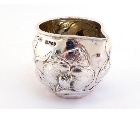 A small German Art Nouveau silver cream jug chased in relief with iris, by Karl Kurz of Kesselstadt, with English import and 