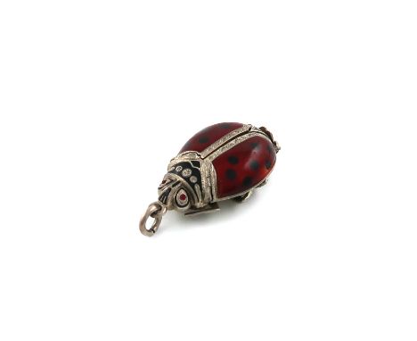 A novelty silver and enamel ladybird vinaigrette, unmarked circa 1900, with sprung red and black enamelled wings, which open 