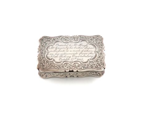 A Victorian presentation silver snuff box, by Francis Marston, Birmingham 1865, rectangular form, chased foliate scroll decor