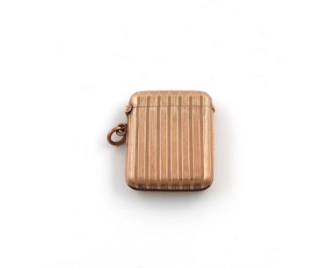 An Edwardian 9 carat gold vesta case, by William Neale, Chester 1908, rectangular form, with bands of reeded decoration, with