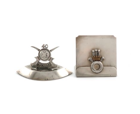 A Regimental silver menu card holder, the 40th Pathans, by the Goldsmiths and Silversmiths Company, London 1922, modelled as 