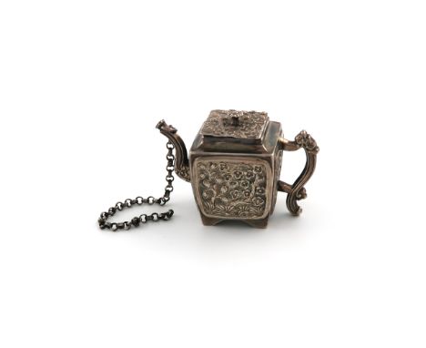 An early Victorian miniature silver Chinoiserie teapot, by Joseph Willmore, Birmingham 1840, square form, chased foliate deco