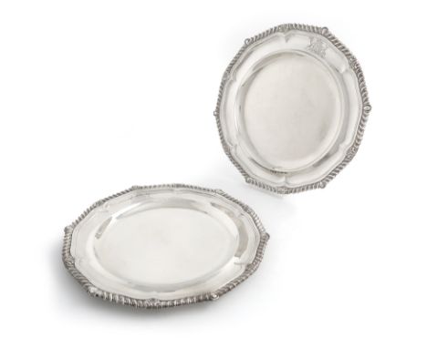 A pair of George III silver plates, by Paul Storr, London 1816, circular form, gadroon border, engraved with an armorial, dia