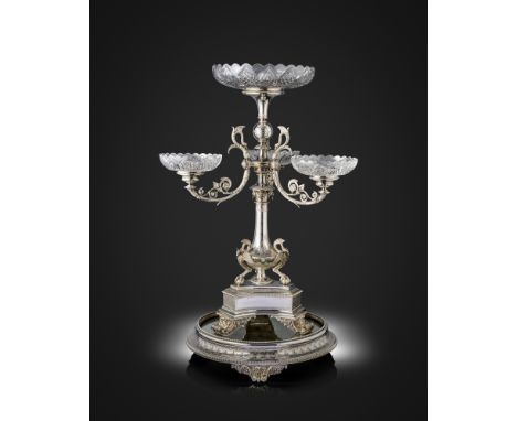 A Victorian silver epergne on a mirrored plateau, by Horace Woodward &amp; Co., Birmingham 1878, the tapering central column 