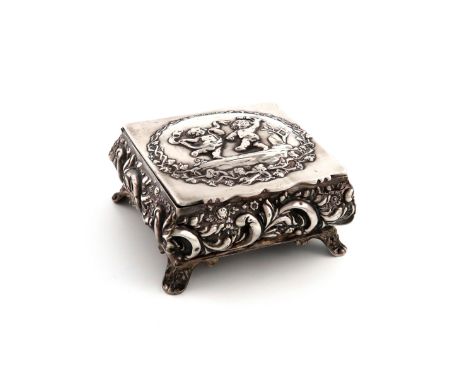 An Edwardian silver dressing table box, probably by Thomas Hayes, Birmingham 1901, square cushion form, embossed foliate scro