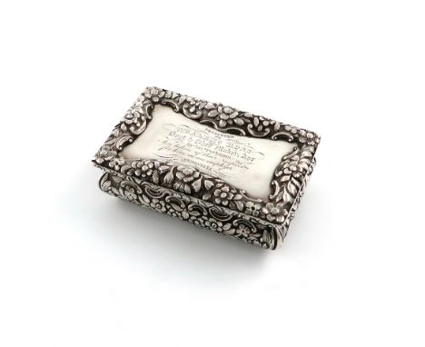 A William IV silver snuff box, by Nathaniel Mills, Birmingham 1834, rectangular cushion form, chased foliate scroll decoratio