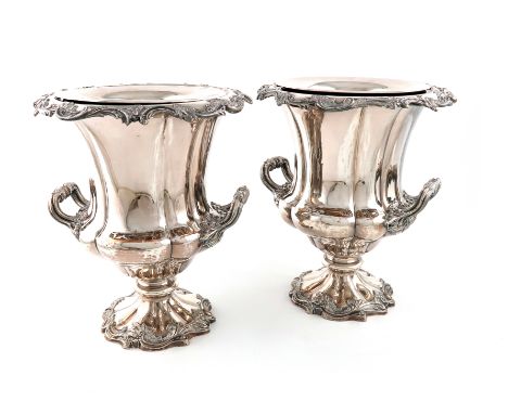 A pair of early 19th century old Sheffield plated wine coolers, by H. Wilkinson and Co. circa 1830, campana form, foliate scr