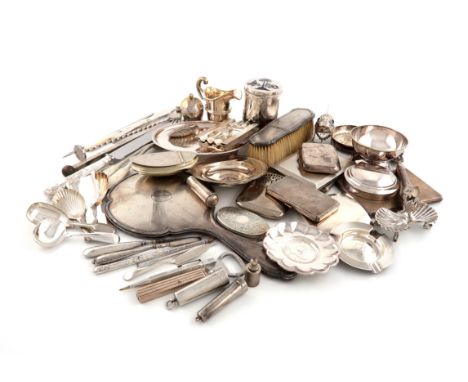 A mixed lot, comprising silver items: six cigarette cases, an armada dish, three ashtrays, a cream jug, a hand mirror, an Ira