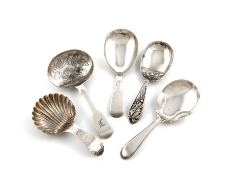 A small collection of five antique silver caddy spoons, various dates and makers, comprising: a George III one by Hester Bate