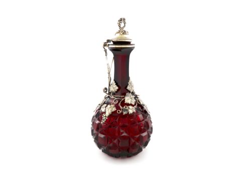 A Victorian silver-gilt mounted squeeze-action red glass decanter/claret jug, by Frederick Elkington, Birmingham 1887, balust