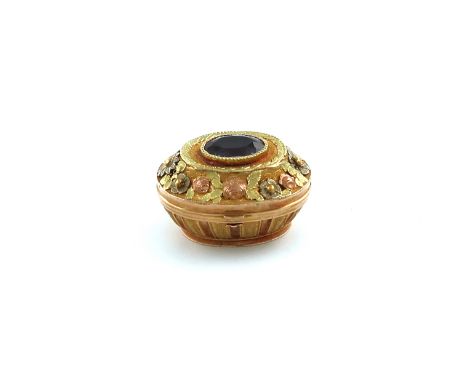 A 19th century French gold vinaigrette, marked with a French control mark, oval form, part-fluted decoration below a chased t