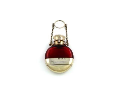 A Victorian silver-gilt mounted red glass scent bottle and vinaigrette, by S. Mordan, London 1871, circular form, plain sprun