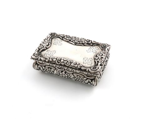 An early Victorian silver snuff box, by Nathaniel Mills, Birmingham 1838, rectangular cushion form, chased foliate scroll dec