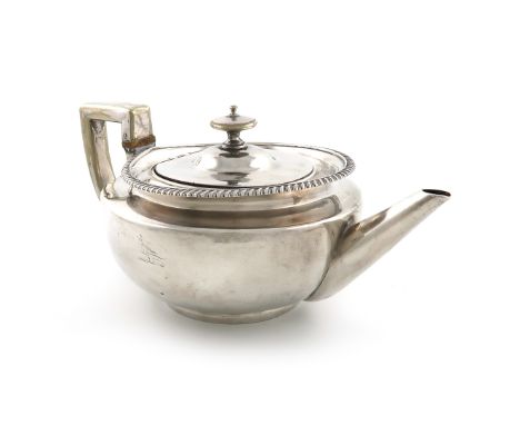 A George III silver teapot, by William Burwash, London 1818, circular form, gadroon border, tapering spout, later detachable 