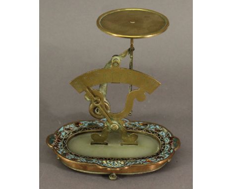A PAIR OF FRENCH BRASS ONYX AND CHAMPLEVE ENAMEL POSTAL SCALES, the scrolled supports marked 'N.B BTE SGDG',the oval base wit