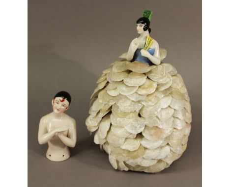 A DRESSEL & KISTER TYPE HALF DOLL LAMP SHADE the half doll's dress with wire structure and covered with numerous shells, 25.5