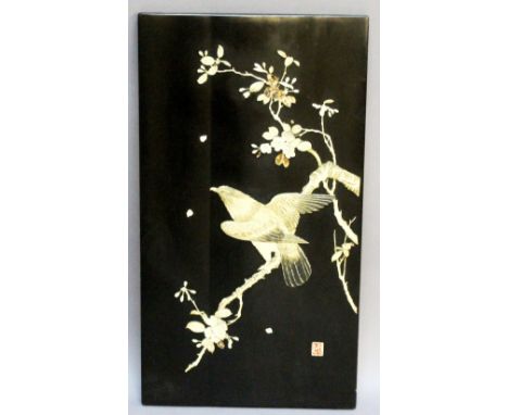 A JAPANESE SHIBAYAMA INLAID LACQUER PANEL of rectangular form, inlaid with bone to depict an eagle perched on a blossoming br