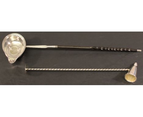 AN 18TH CENTURY WHITE METAL AND BALEEN TODDY LADLE having an ovoid bowl with reeded rim, generous spout, inset Queen Anne coi