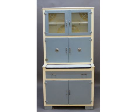 A 1950'S KITCHENETTE CABINET with etched glass panel doors, vented doors and sliding enamel work surface, the lower stage wit