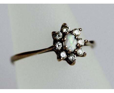 A SMALL GROUP OF 9CT GOLD JEWELLERY, an opal and white stone cluster (size N), an opal cabochon ring (size M-N), a wedding ba