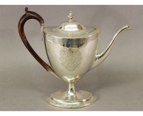 A GEORGE III SILVER COFFEE POT of Neo-Classical shape, with contemporary cartouché, leaf and gadrooned engraving, with fruitw