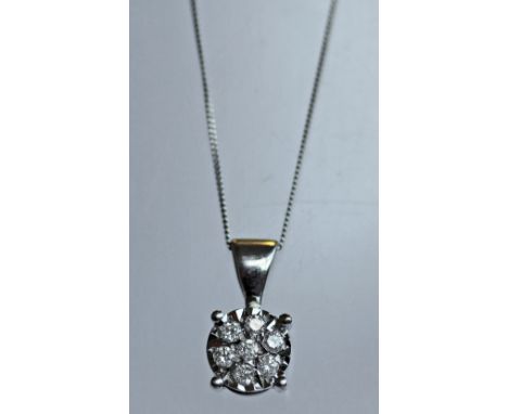 A 9CT WHITE GOLD AND DIAMOND PENDANT inset with seven small diamond brilliants totalling 0.17cts approx, suspension loop and 