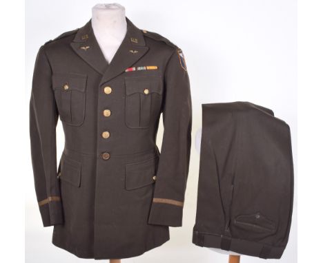 WW2 USAAF 4th Air Force Officers Uniform, consisting of four pocket brown tunic with gilt metal US collar badges, winged prop