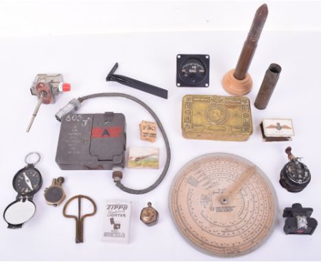 A Quantity of Military Collectibles, including: A WW1 Princess Mary tin, 2 x Trench Art gas lighters, British Langley Ltd Ran