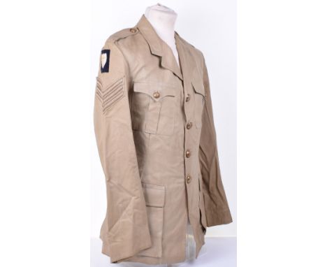 WW2 3rd Carabineers Tropical Tunic, being a four pocket KD tunic with brass regimental buttons, embroidered 8th army formatio