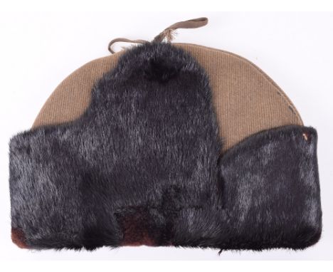 WW2 1941 Dated Canadian Winter Issue Headdress, ribbed khaki cloth with black fur fold down sides and front. Quilted lining w