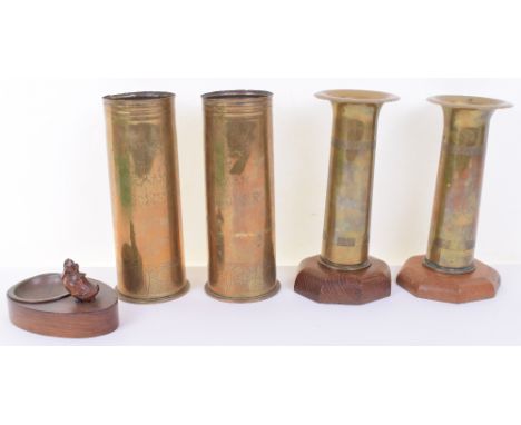 WW1 Trench Art made by German Prisoner of War of Queens Regiment Interest, two brass shells, engraved with regimental badge o