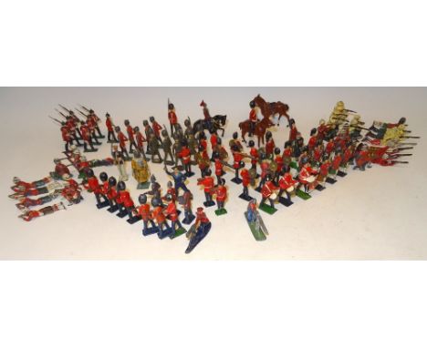 Various hollowcast toy soldiers mostly in full dress, Foot Guards, Highlanders and Infantry (Condition Good-Poor, some damage