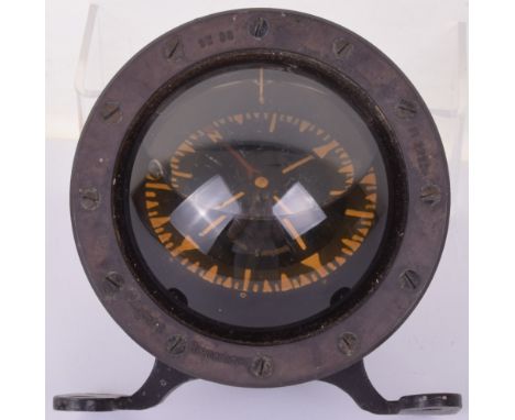 WW2 German Luftwaffe Aircraft Compass, being a liquid filled example in bakelite casing having manufacturers plaque attached.