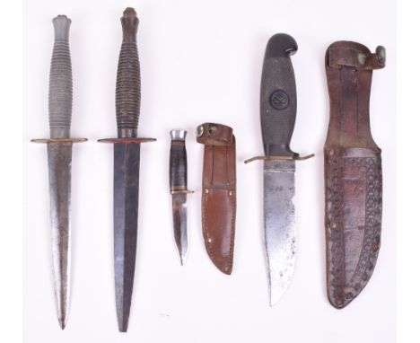 2x Fairbairn Sykes (F.S) Commando Knives, both being late WW2 pattern examples with one piece ribbed grips. One having cross 