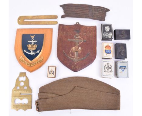 Military and Home Front Items, 7x match box covers, 2 button sticks, 1941stamped side hat , piece of shrapnel and 2 W.R.E.N. 